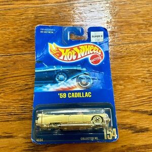 Mattel Hot Wheels ‘59 Cadillac convertible.  Package dates 1991.  Die Cast Metal